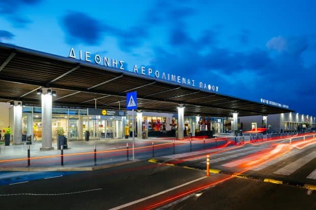 The Paphos International Airport terminal at dusk